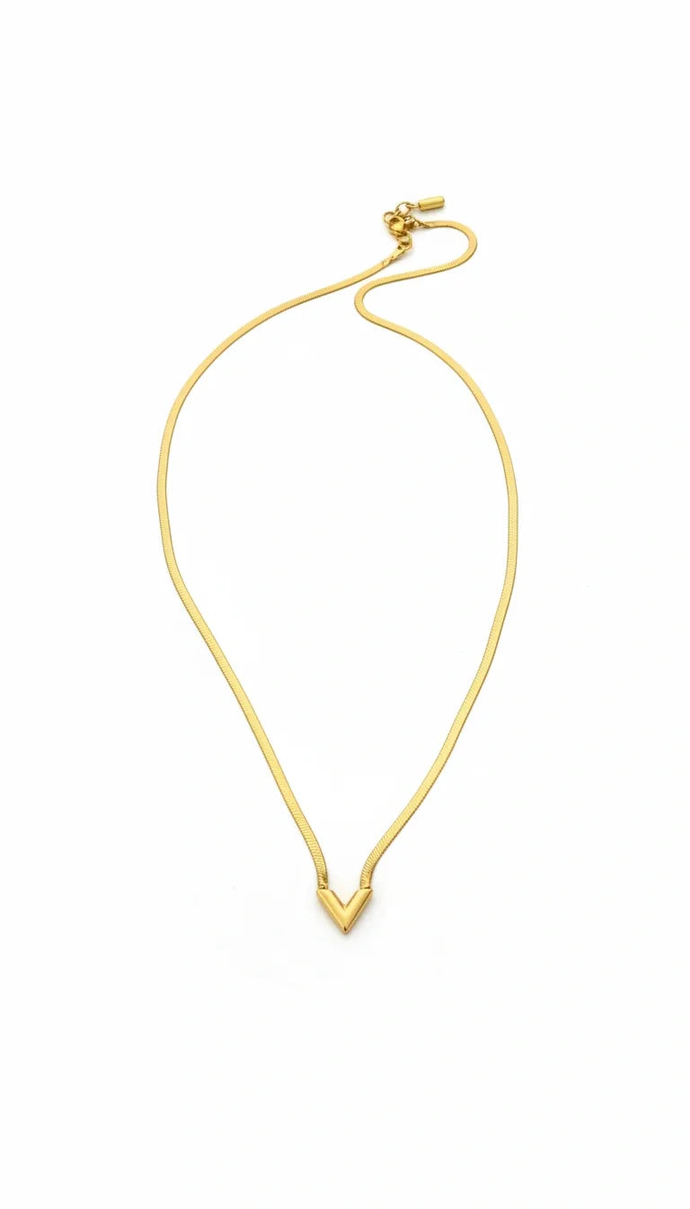 Gold necklace on a white background